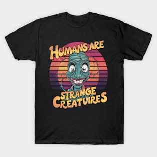 Humans are strange creatures Resident alien T-Shirt